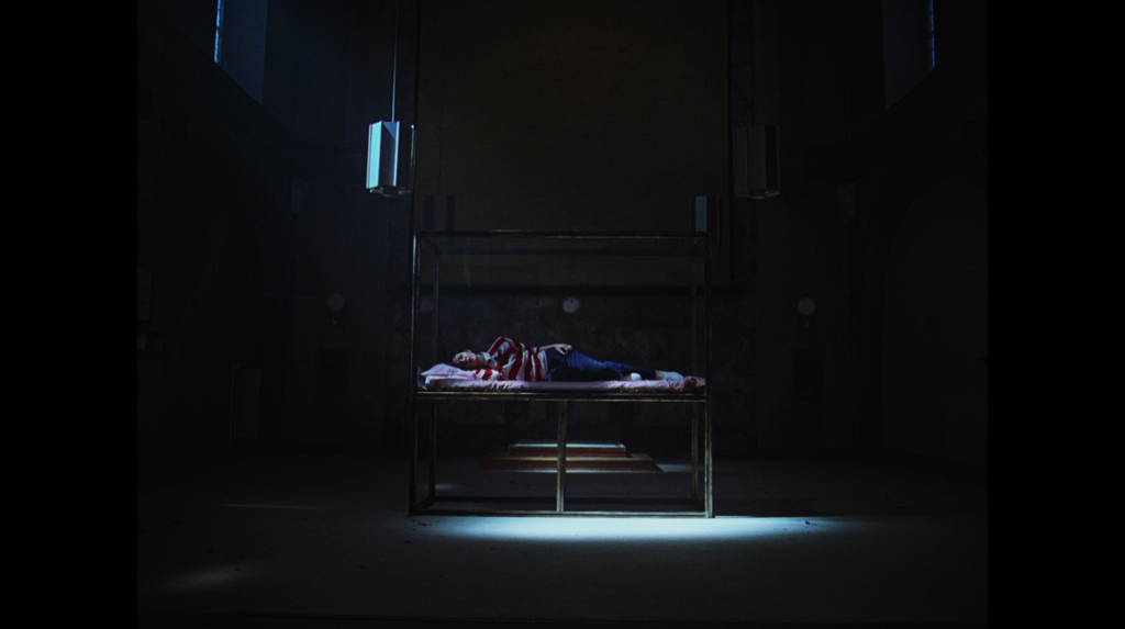 Still from Gracie Abrams music video Hit the Wall 