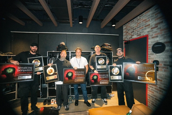 L-R: Breaking Benjamin’s Benjamin Burnley and Jasen Rauch; BMG’s Sean Heydorn; Breaking Benjamin’s Aaron Bruch and Keith Wallen